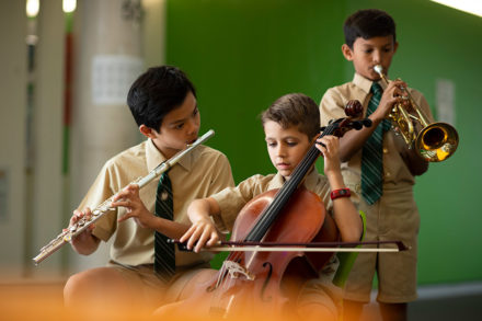 Boys Playing Music Instruments